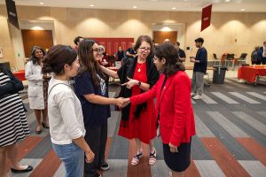 Dean Nita Ahuja introduces herself to students.