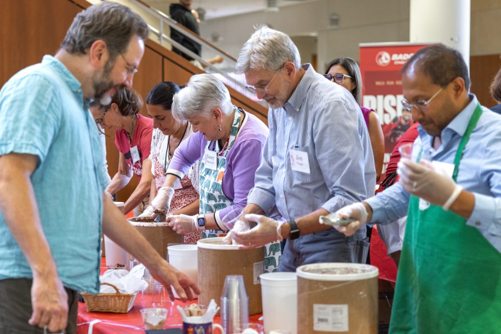 School leadership scooping ice cream.