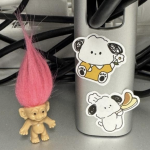 A troll doll with pink hair