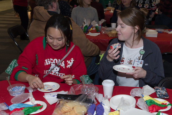 SMPH community decorates cookies at the 2025 SMPH Sweater Weather Social.