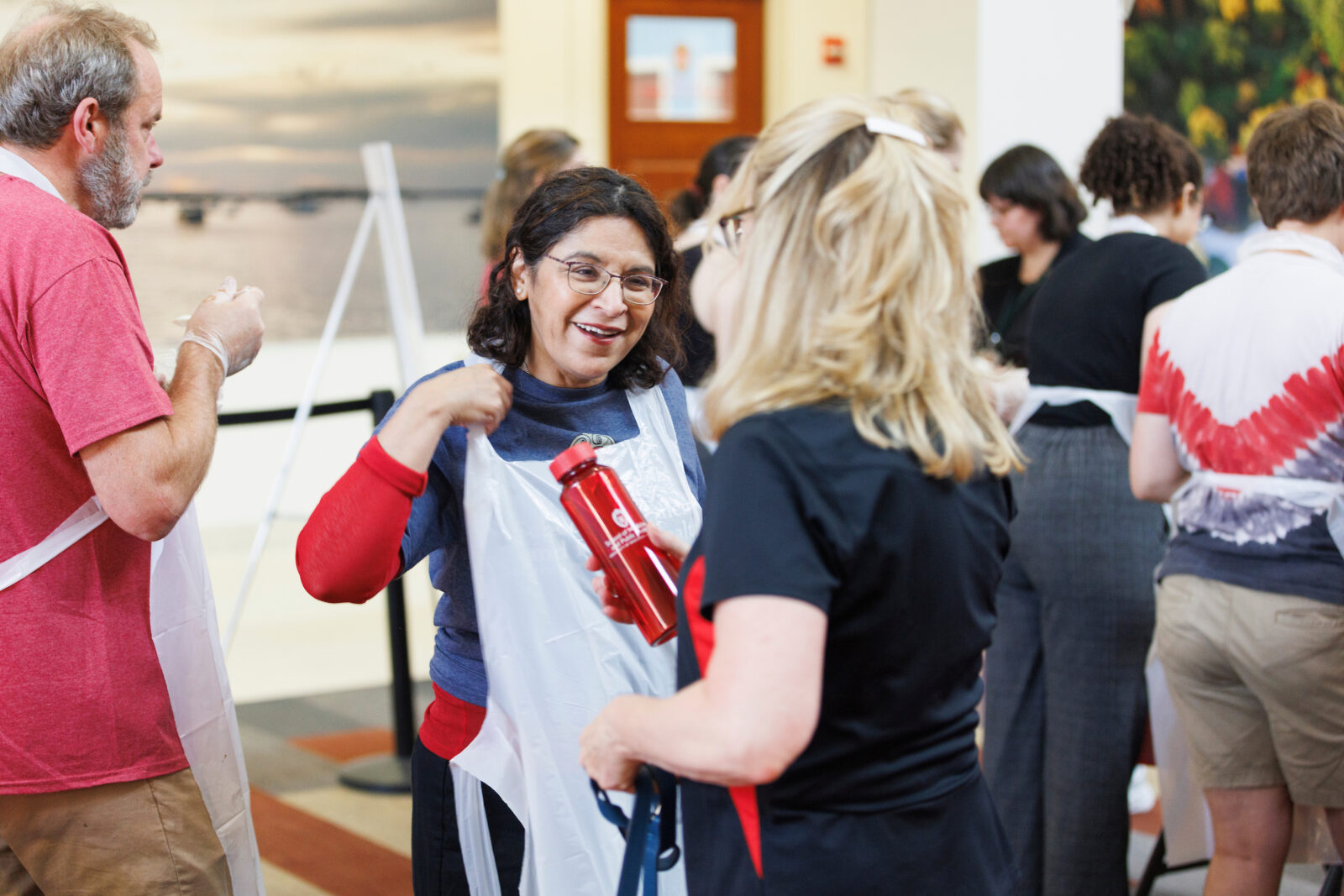 Dean Ahuja greets SMPH staff and faculty at Ice Cream Social.
